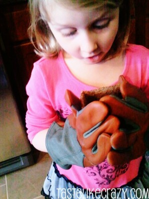 Cara thinks my Fields & Lane gardening gloves will make her plants grow.