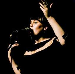 adele singing image from official site